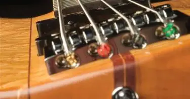 how to fix a bowed guitar neck without a truss rod