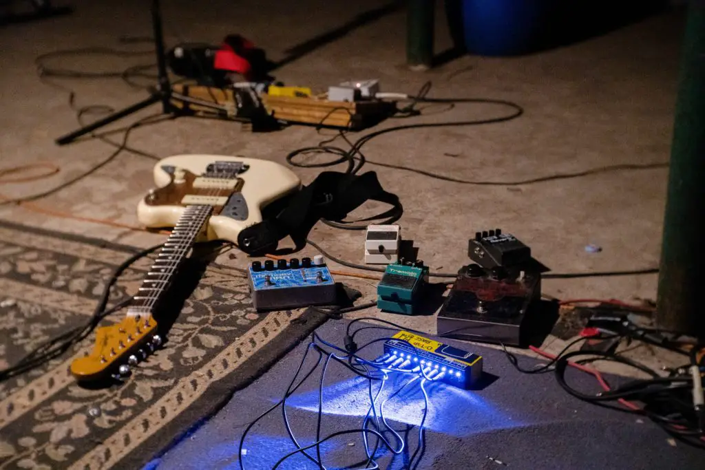 Guitar and guitar pedals on the floor